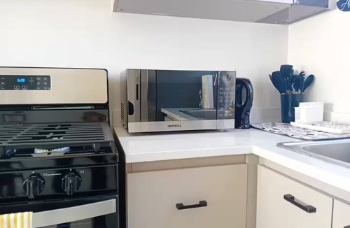 Portmore House | Cozy Escapes 876: Secure 2BR with AC, Parking & near Beaches