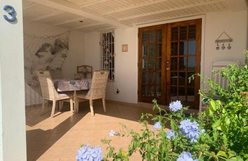 Dickenson Bay Apartment | Cozy sea view apartment with beach at walking distance and pool