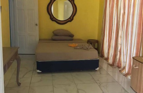 Rodney Bay Hotel | Cozy Single & Double Room Suites