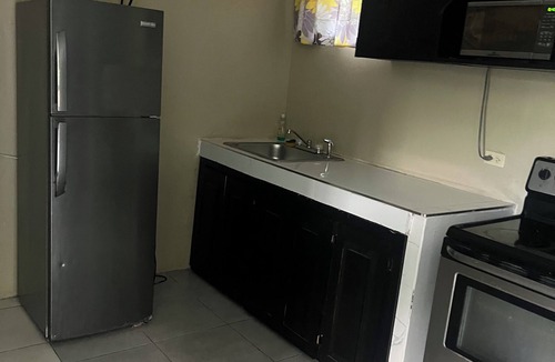 Constant Spring Apartment | Cozy studio with 2 queen size bed in serene Kingston with AC