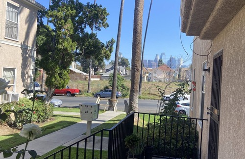 Pico-Union Apartment | CStudio in DTLA with private entrance, courtyards with roses an view of city