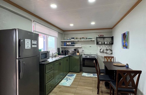 Calibishie Apartment | D'Horizon Comfort Suites: Spacious 2 bedroom apartments with Epic Views