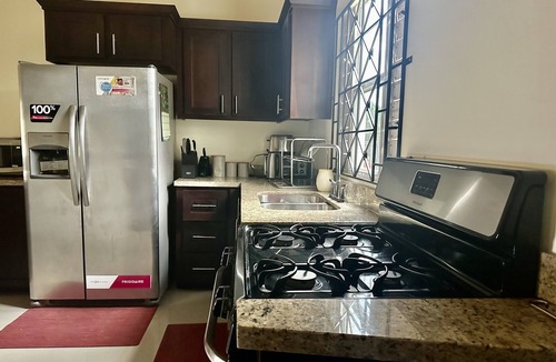 St. Ann's Bay House | Dell’s Exotic Haven 2 bedrooms, 2 baths, pool, gym