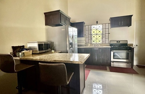 St. Ann's Bay House | Dell’s Exotic Haven 2 bedrooms, 2 baths, pool, gym