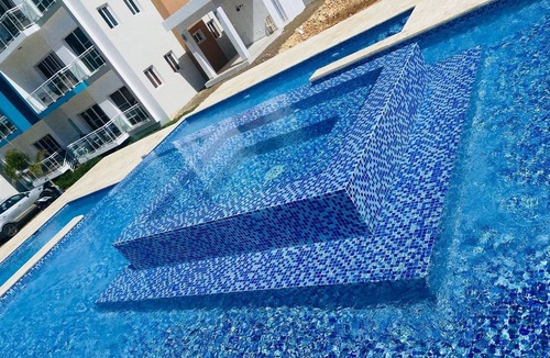 Urbanizacion Tavarez Apartment | Elegant 2BR/2BA condo: unwind by the pool. Guest-friendly, near all