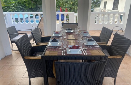 Tower Isle House | Elegant Estate Home Ocean/view . balconies Garden/pool view lush greenery