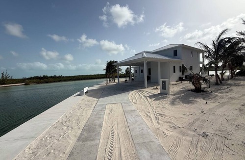 Sandy Point House | Enchanting Luxury Beachfront Villa Stillwater in Sandy Point views of Parrot Cay