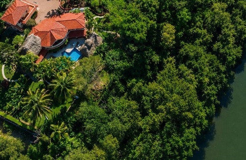 San Ignacio House | Escape to a private luxury jungle villa with an infinity pool and breathtaking views, just minutes from San Ignacio. Explore Maya ruins, ATM Cave and waterfalls by day. Return to your own tropical sanctuary, with personalized concierge service.