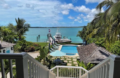 Dunmore Town House | Exquisite Bay front Estate, dockage 100' boat, LG pool, close to town and beach.