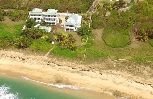 St. Patrick Villa | Family Friendly age 8 and up, Oceanfront, Pool, Kitchen. Pelican at Moonfish.