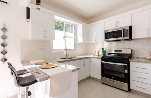 Santiago Province Apartment | first floor apartment in Santiago king side bed pool