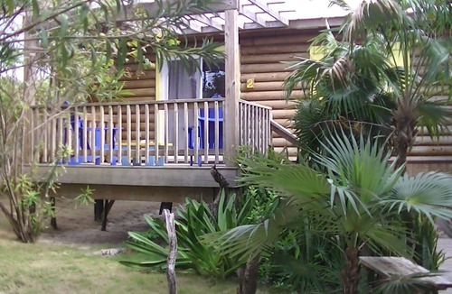 Great Guana Cay Cottage | Funky and unique cottage on the best beach in the Bahamas