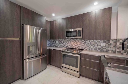 Seven Mile Beach Apartment | Garden View Unit at Plantana Condominiums