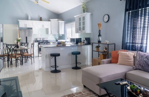 Portmore House | Gated Retreat with Resort Pool, Caymanas Estate