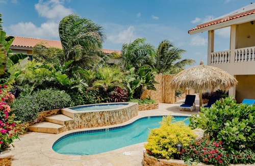 Bubali Apartment | Gorgeous modern 1-bedroom apartment with tropical garden, pool and whirlpool