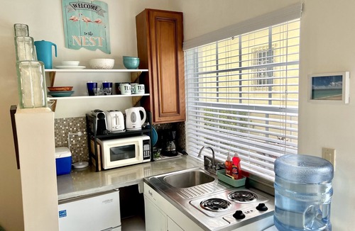 The Bight Apartment | Grace Bay Getaway: Beachwalk Compact Studio with shared Pool and Free Parking