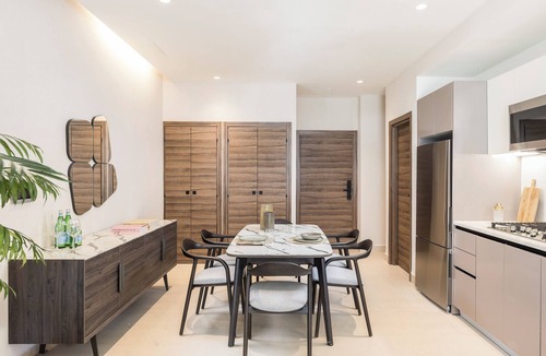 Yolanda Morales Apartment | Homeclub 1BR Residence BlueMall Rooftop Pool & Gym
