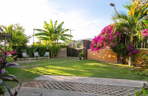Molynes Gardens Apartment | Kingston Vacation Rentals at Gardens of Bliss 2 - Beautiful Suite with Fishpond, Kingston