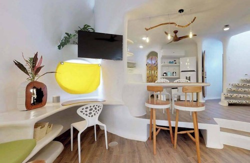 Cocoplum Villa | Lagoon view retreat villa with pool, private hot tub, & AC
