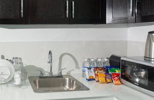 Pembroke Hall Apartment | Luxurious condo with a incredible view of the hills