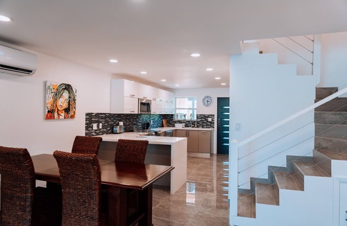 Jolly Harbour Condo | Luxurious & Stunning! Mountain & Sea Views! 222D