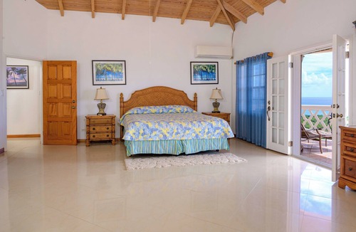 Cades Bay Villa | Luxury 5-Bedroom Villa with Oceanview Infinity Pool & Spectacular Sunsets