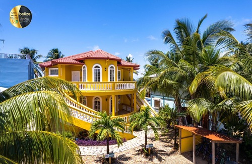 Hopkins House | Luxury, Beachfront, Home with Resort-amenities, Housekeeping & FREE GOLF CART.