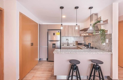Downtown Santo Domingo Apartment | Luxury Piantini Apt: Rooftop Pool & Gym Access