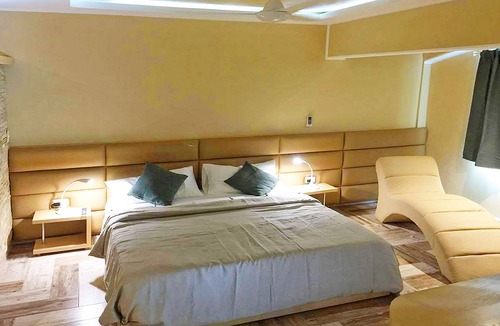 El Batey Hotel | Luxury guest-friendly room in downtown Sosua, AC/Cable TV/Internet