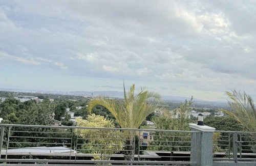Saint Andrew Apartment | Maison Blanc et Noir|A luxury Kingston 8 apartment with a cinematic rooftop pool