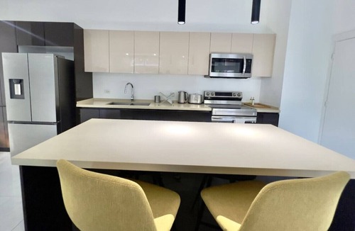 Saint Andrew Apartment | Modern 2BR Condo | Pool | Prime Kingston 6
