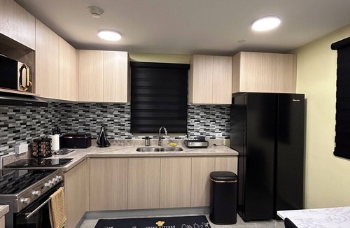 Eden Gardens Apartment | Modern City Apartment w/pool & fast WiFi- Close to Airport