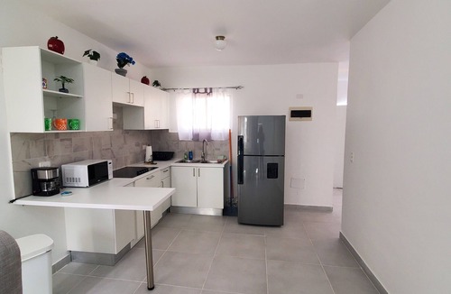 Veron House | Modern Family Haven Designed for Comfort & Connection With Community Pool Access