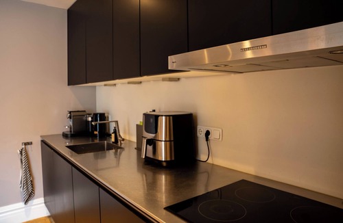 Overtoomse Sluis Apartment | Modern Luxury Suite Steps from Vondelpark & Museum District | Historic Charm