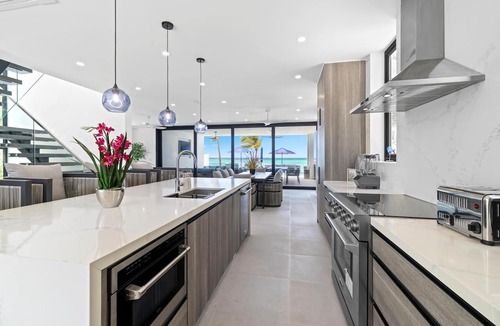 Blue Hills Villa | New BEACHFRONT Aqua Blu Villa-4 King Bdrm/6 Bath-Oceanfront bliss-up to 8 guests