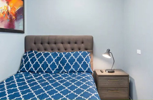 San Juan Apartment | NEW! Modern Beachfront Studio steps from water!
