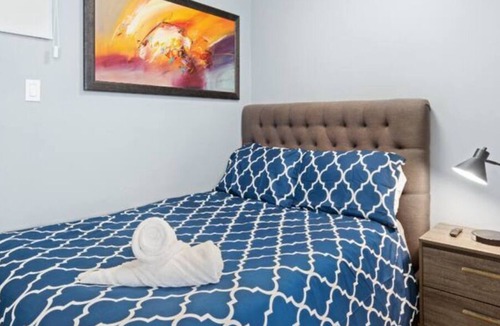 San Juan Apartment | NEW! Modern Beachfront Studio steps from water!