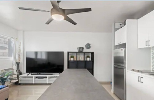 San Juan Apartment | NEW! Modern Beachfront Studio steps from water!