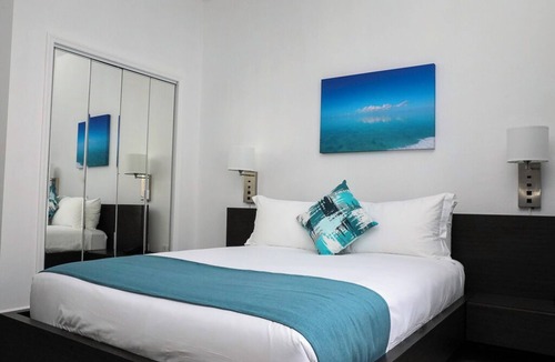 Whitby Hotel | Ocean Breeze Resort - 2-bedroom Hotel Suites, Pool, Gym and Restaurant
