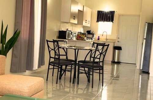 Discovery Bay Villa | Ocean View 2-bedroom villa with AC, WiFi in Discovery Bay Beach/Pool Access