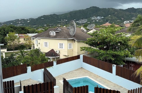 Barbican Apartment | One Bedroom Gated Apartment with rooftop terrace mountain views and pool