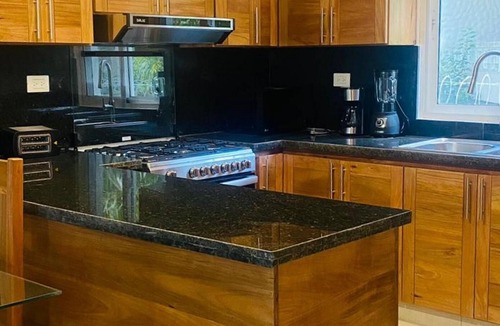 Urbanizacion Tavarez Apartment | Pool & parking in a 2BR/1BA gem – Steps to everything you need