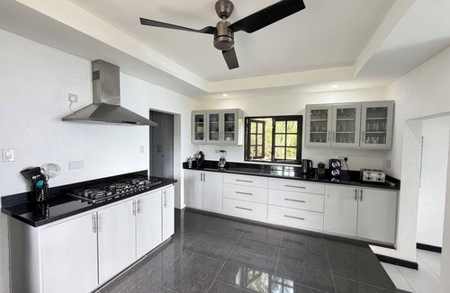 Spring Estate Villa | Private 4BR Villa with Wraparound Pool, Rooftop Lounge & Ocean Views