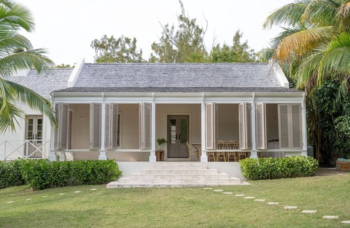 Dunmore Town House | Private home steps from the pink sand of Harbour Island w pool and guest cottage