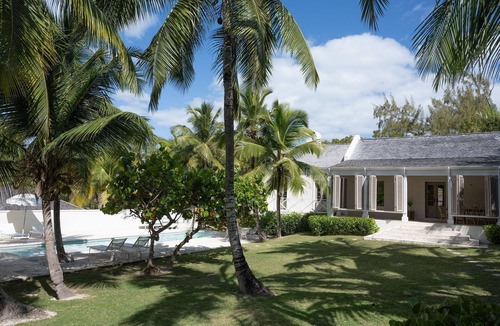 Dunmore Town House | Private home steps from the pink sand of Harbour Island w pool and guest cottage