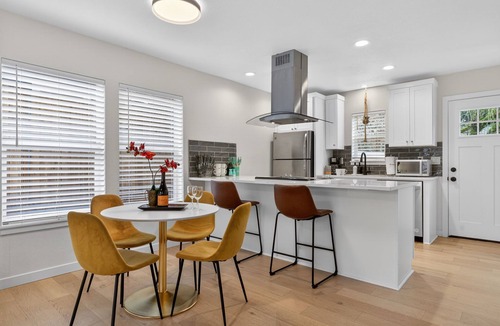 Alberta Arts District House | Retro-Chic Walk to Galleries + Cafés Fenced