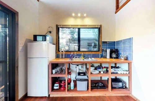 Surfside Cabin | Romantic cabana with veranda, hammock, partial AC & WiFi - walk to the beach