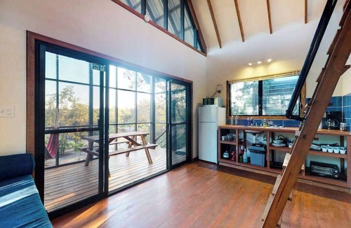 Surfside Cabin | Romantic cabana with veranda, hammock, partial AC & WiFi - walk to the beach