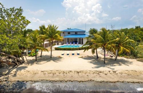 Caribbean Way Villa | South Gull - 5 Bedroom Beachfront Villa w Large Pool Staff