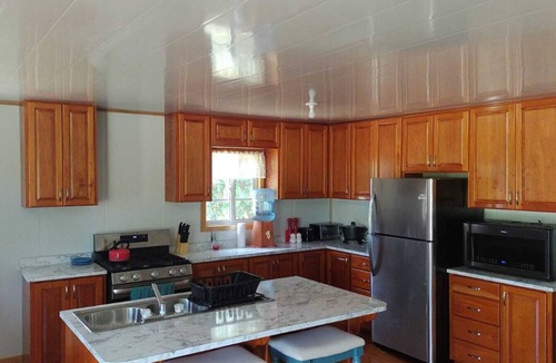 Sittee Point House | Spacious 4-bedroom house in charming Stann Creek with WiFi, AC